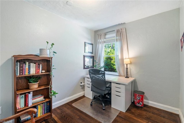office area with baseboards and wood finished floors
