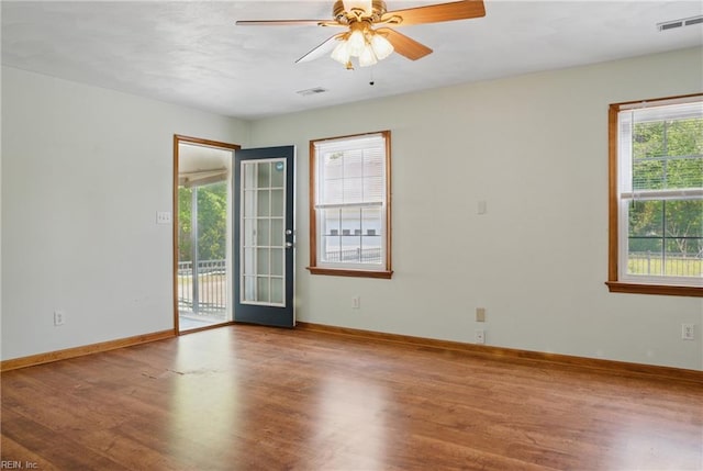 189 George Washington Hwy S, Chesapeake, VA 23323 - unfurnished room with visible vents, a ceiling fan, baseboards, and wood finished floors