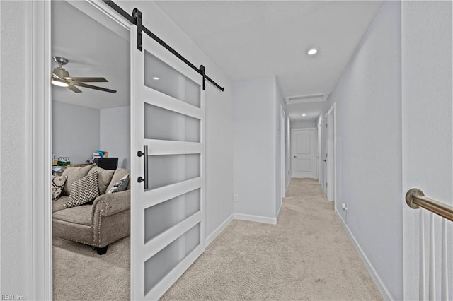 2848 Kingsfield Dr, Virginia Beach, VA 23456 - hallway with light colored carpet, a barn door, built in shelves, recessed lighting, and baseboards