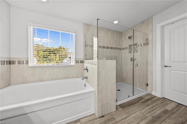 2848 Kingsfield Dr, Virginia Beach, VA 23456 - bathroom with a garden tub, recessed lighting, wood finished floors, and a shower stall
