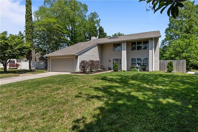 view of front of property featuring fence, an attached garage, driveway, and a front lawn
