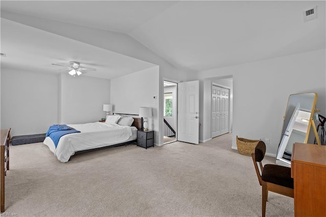 carpeted bedroom with a ceiling fan, baseboards, vaulted ceiling, and visible vents