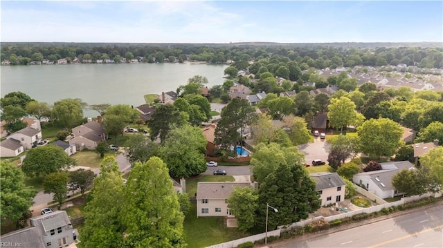 bird's eye view featuring a residential view and a water view