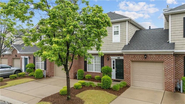 5324 Tamworth Pl, Virginia Beach, VA 23455 - view of front facade featuring concrete driveway, brick siding, a shingled roof, and an attached garage