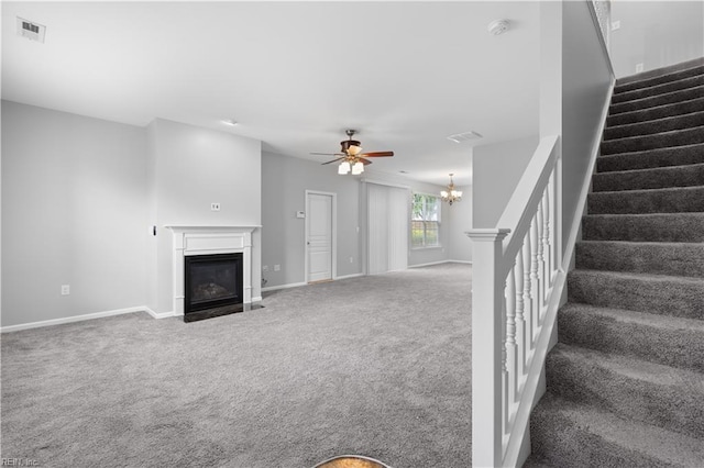 5324 Tamworth Pl, Virginia Beach, VA 23455 - unfurnished living room featuring a fireplace with flush hearth, carpet, stairs, baseboards, and ceiling fan
