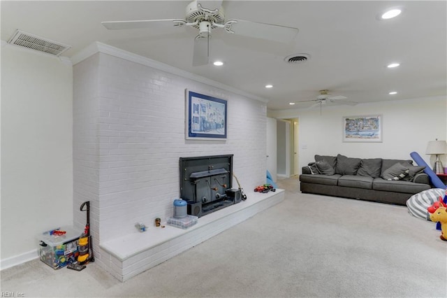 living room featuring visible vents, a ceiling fan, carpet, and recessed lighting