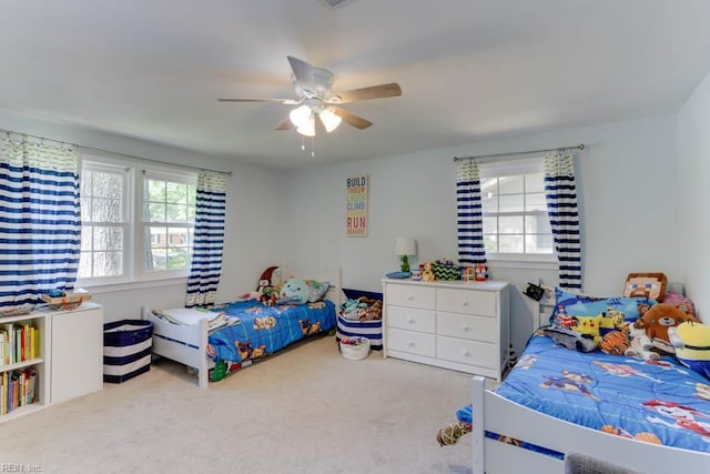 bedroom with carpet flooring and ceiling fan