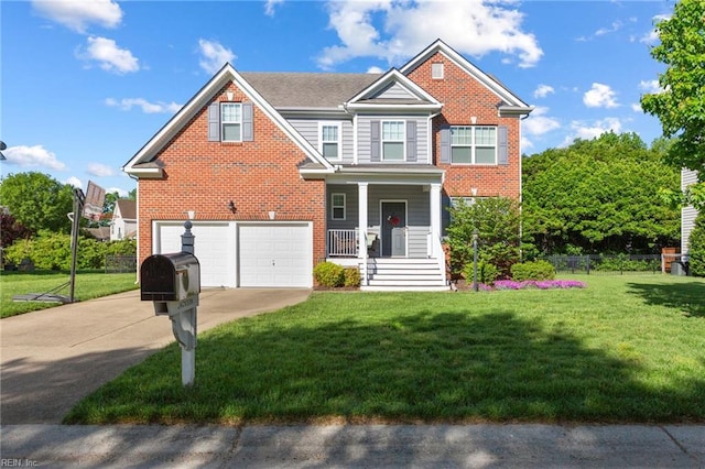 13095 Lighthouse Ln, Carrollton, VA 23314 - view of front facade featuring driveway, a garage, covered porch, and brick siding