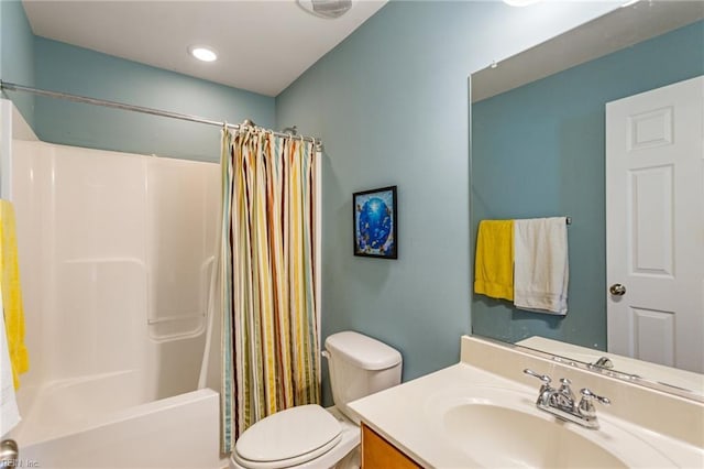 13095 Lighthouse Ln, Carrollton, VA 23314 - bathroom featuring toilet, vanity, and shower / bath combo with shower curtain