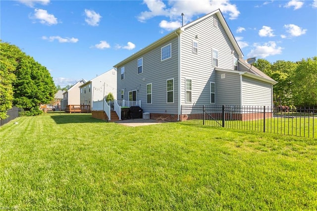 13095 Lighthouse Ln, Carrollton, VA 23314 - rear view of house with a patio area and a deck
