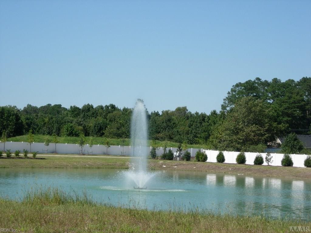 water view featuring fence