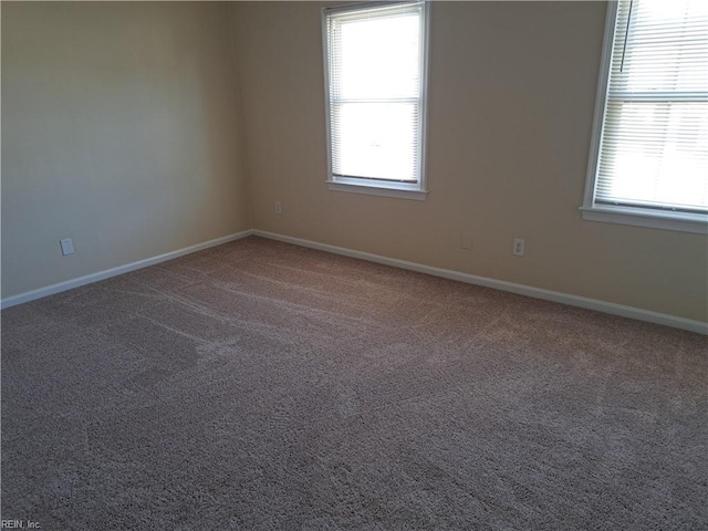 5527 Baccalaureate Dr, Virginia Beach, VA 23462 - carpeted spare room featuring baseboards and a healthy amount of sunlight