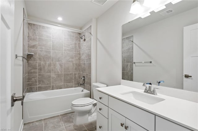 bathroom with shower / bathtub combination, toilet, visible vents, and vanity