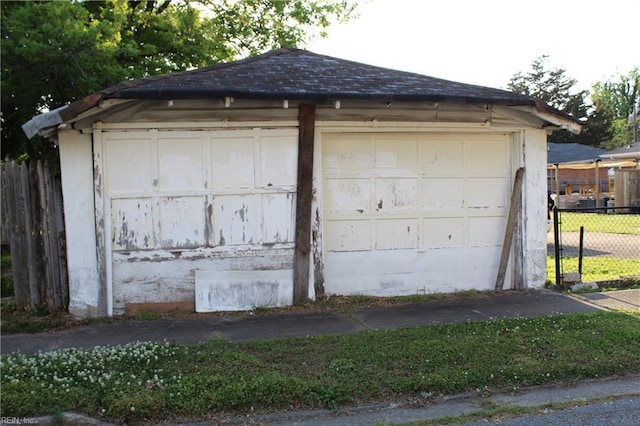 detached garage with fence