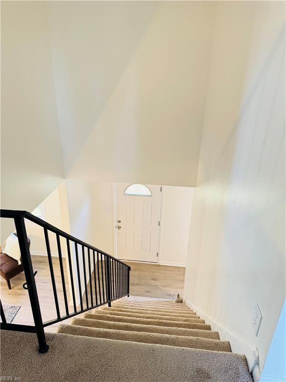 529 Stockton St, Hampton, VA 23669 - stairway featuring baseboards and wood finished floors