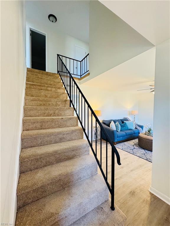 529 Stockton St, Hampton, VA 23669 - stairs featuring wood finished floors, baseboards, and a ceiling fan