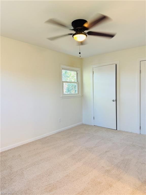 529 Stockton St, Hampton, VA 23669 - unfurnished bedroom with carpet, baseboards, and ceiling fan