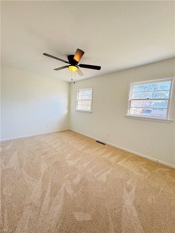 529 Stockton St, Hampton, VA 23669 - unfurnished room with baseboards, carpet, and a ceiling fan