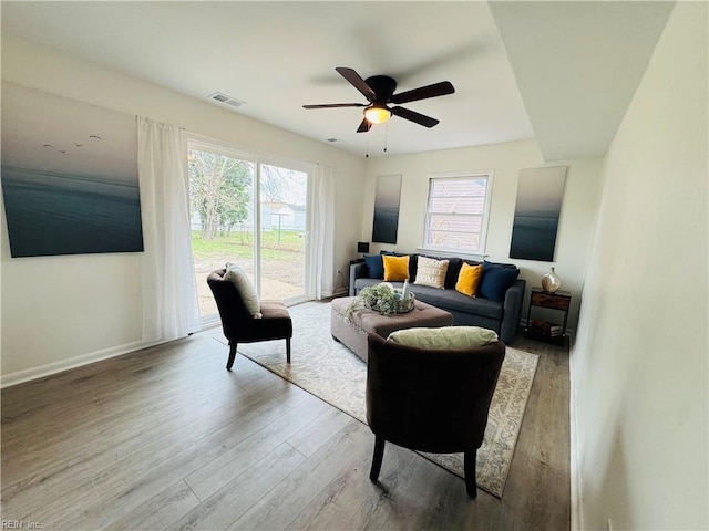 529 Stockton St, Hampton, VA 23669 - living area with plenty of natural light, wood finished floors, ceiling fan, and baseboards