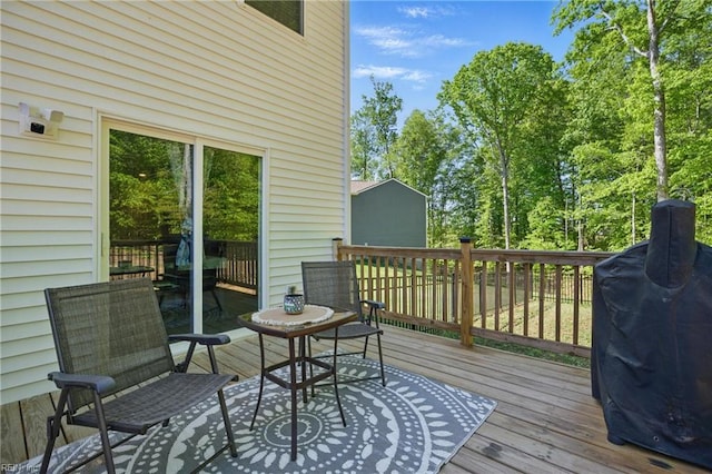 wooden terrace with grilling area