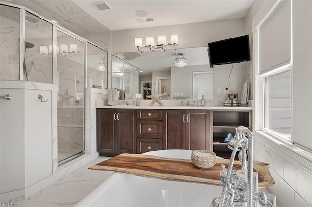 bathroom with double vanity, visible vents, a marble finish shower, and marble finish floor