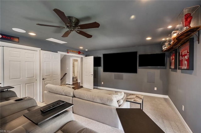 carpeted cinema room with baseboards, ceiling fan, and recessed lighting