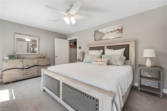 bedroom featuring carpet floors, baseboards, and ceiling fan