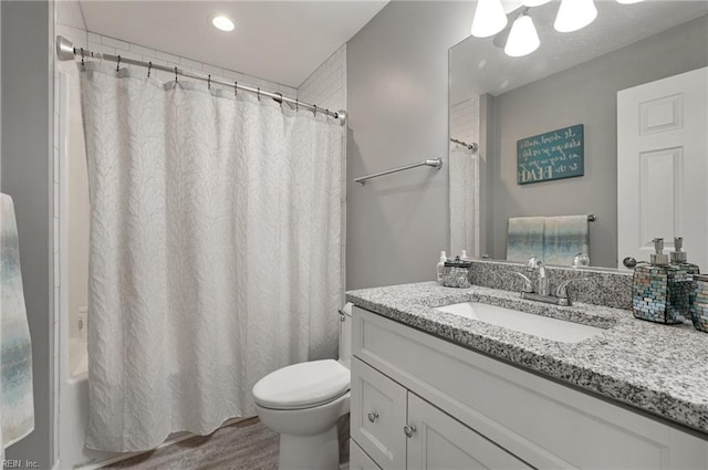 full bath featuring shower / tub combo with curtain, vanity, toilet, recessed lighting, and wood finished floors