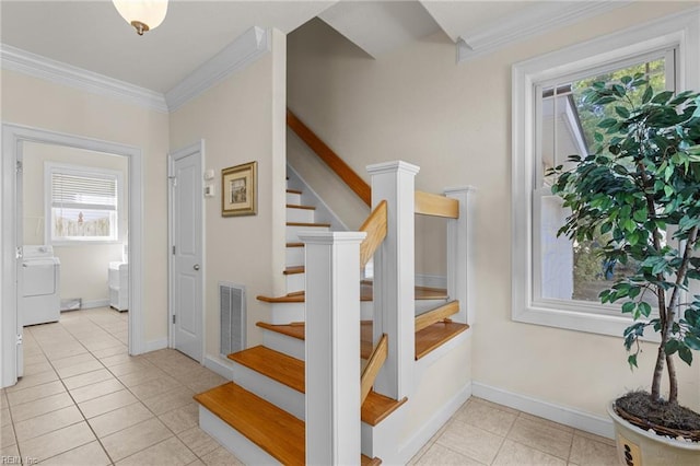 8506 Atlantic Ave Unit B, Virginia Beach, VA 23451 - staircase featuring visible vents, separate washer and dryer, tile patterned flooring, and a wealth of natural light