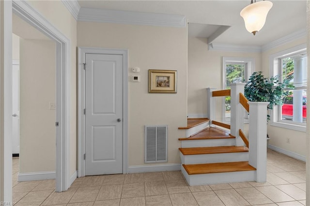 8506 Atlantic Ave Unit B, Virginia Beach, VA 23451 - stairs featuring baseboards, ornamental molding, tile patterned floors, and visible vents