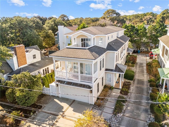8506 Atlantic Ave Unit B, Virginia Beach, VA 23451 - exterior space with an attached garage, fence, a residential view, and a balcony