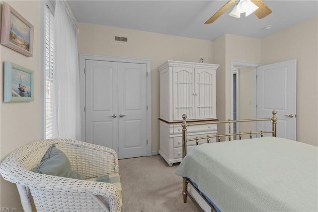 8506 Atlantic Ave Unit B, Virginia Beach, VA 23451 - bedroom with visible vents, ceiling fan, a closet, and light carpet