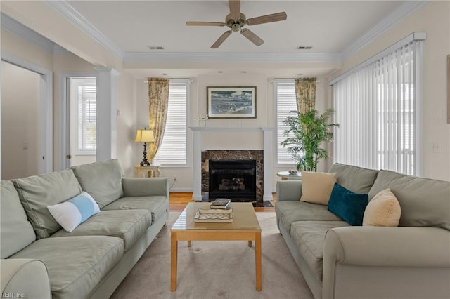 8506 Atlantic Ave Unit B, Virginia Beach, VA 23451 - living room with crown molding, a fireplace, a ceiling fan, and visible vents