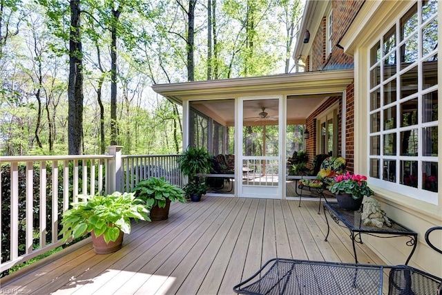 wooden terrace with a sunroom
