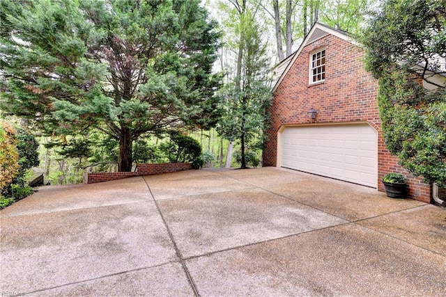 garage featuring driveway