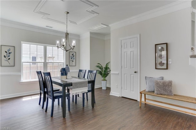 dining room with crown molding, visible vents, dark wood-type flooring, and a chandelier