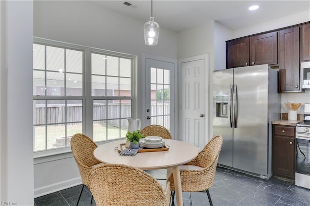 dining area featuring visible vents and recessed lighting
