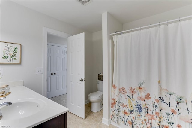 bathroom featuring tile patterned flooring, vanity, toilet, a shower with curtain, and visible vents