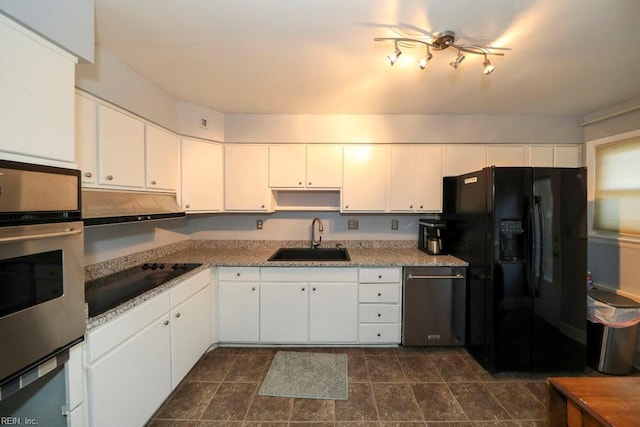 8562 Executive Dr Unit B2, Norfolk, VA 23503 - kitchen with a sink, light countertops, white cabinetry, under cabinet range hood, and black appliances