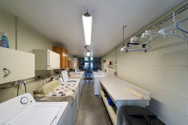 8562 Executive Dr Unit B2, Norfolk, VA 23503 - laundry area featuring washer and dryer and concrete block wall
