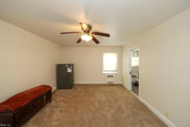 8562 Executive Dr Unit B2, Norfolk, VA 23503 - carpeted spare room featuring a ceiling fan, baseboards, and radiator heating unit