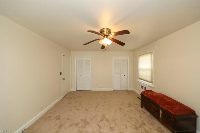 8562 Executive Dr Unit B2, Norfolk, VA 23503 - carpeted bedroom with multiple closets, baseboards, a ceiling fan, and visible vents