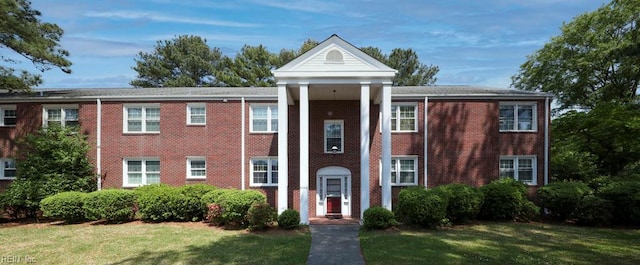 8562 Executive Dr Unit B2, Norfolk, VA 23503 - neoclassical / greek revival house featuring brick siding and a front lawn