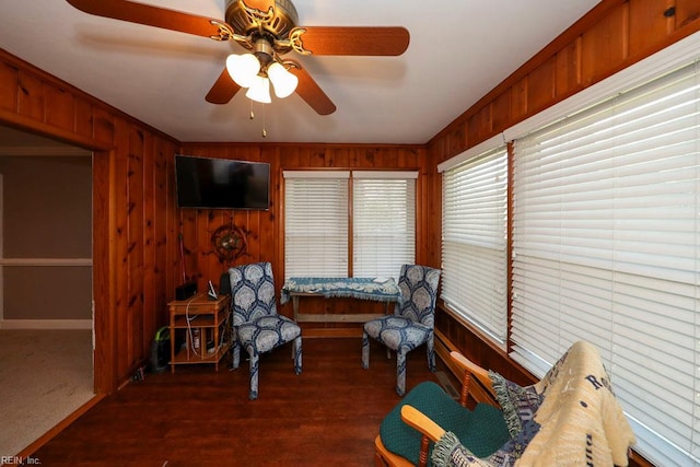 8562 Executive Dr Unit B2, Norfolk, VA 23503 - living area featuring baseboards, ceiling fan, and wooden walls