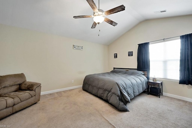 carpeted bedroom featuring baseboards, visible vents, ceiling fan, and lofted ceiling