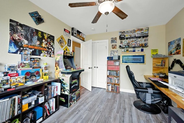 home office featuring ceiling fan and wood finished floors