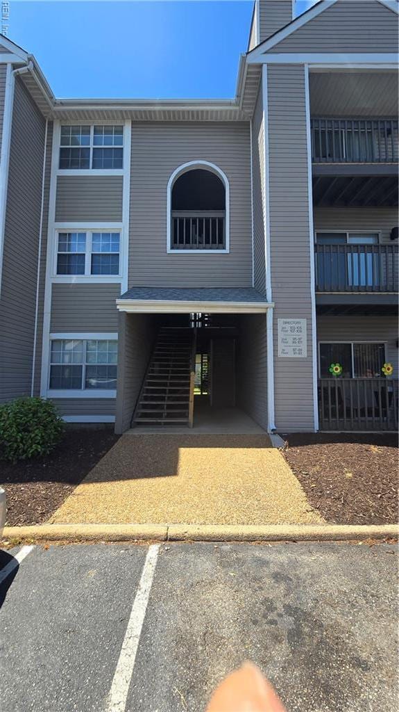 view of front of property featuring uncovered parking