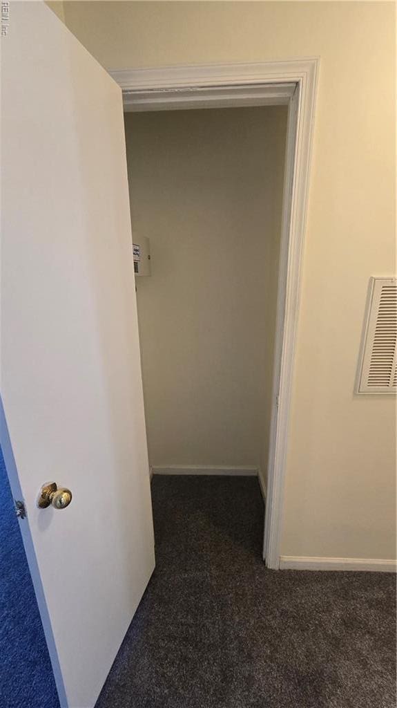 corridor with visible vents and carpet