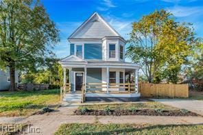 1151 24th St, Newport News, VA 23607 - victorian home with fence and a porch