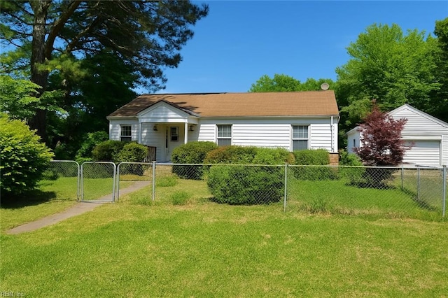 bungalow with fence private yard, a gate, a front lawn, and a detached garage